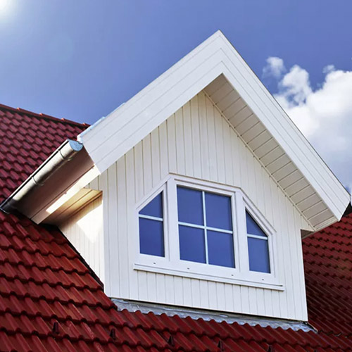 White dormer on red roof